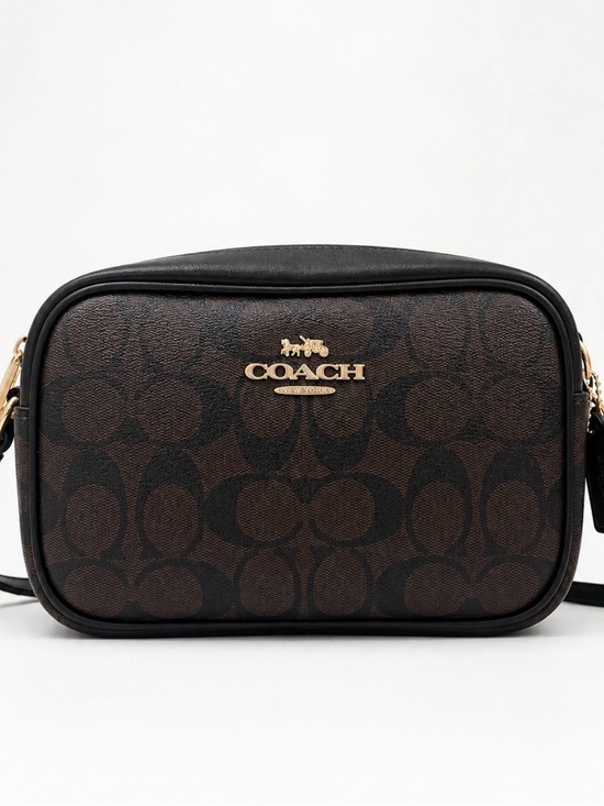 Coach Handbags - Coach Brown and Black Signature Canvas Camera Bag with Gold Hardware